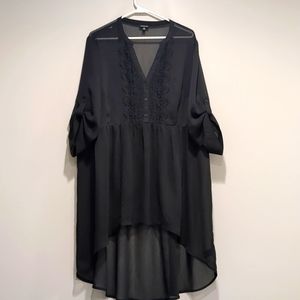 Torrid sheer high-low blouse.